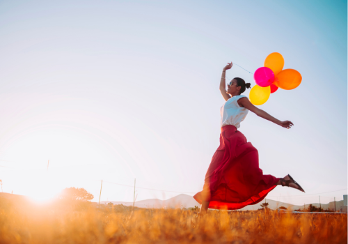 person with balloons